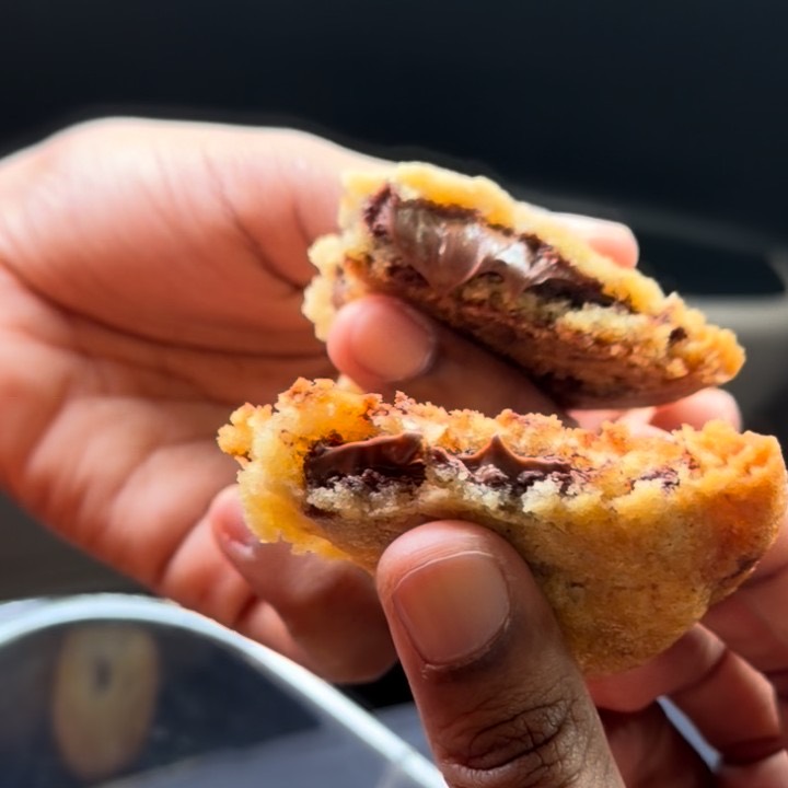 A Nutella cookie split into two halves