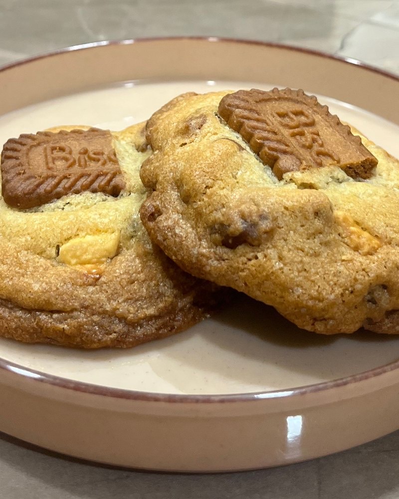 Biscoff cookies, each topped with a biscuit