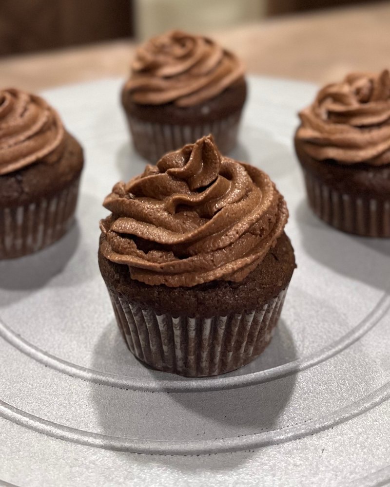 Chocolate buttercream cupcakes with piped swirls